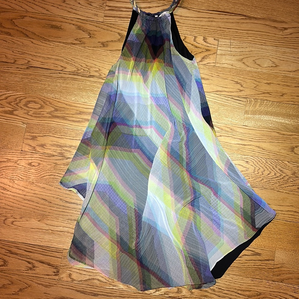 NWOT. Woman’s Rachel Roy colorfully patterned dress. Size XS.